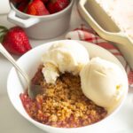 A bowl of strawberry rhubarb crisp.