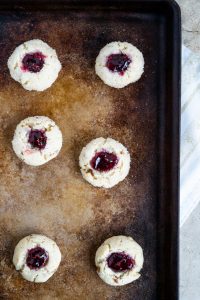 Raspberry cheesecake Thumbprint Cookies With Pecans- The Delicious Spoon