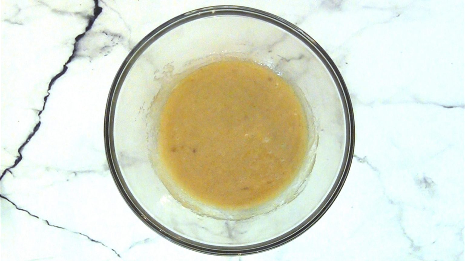 Bowl of sugar and egg mixture