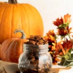 Roasted pumpkin seeds in a small metal basket