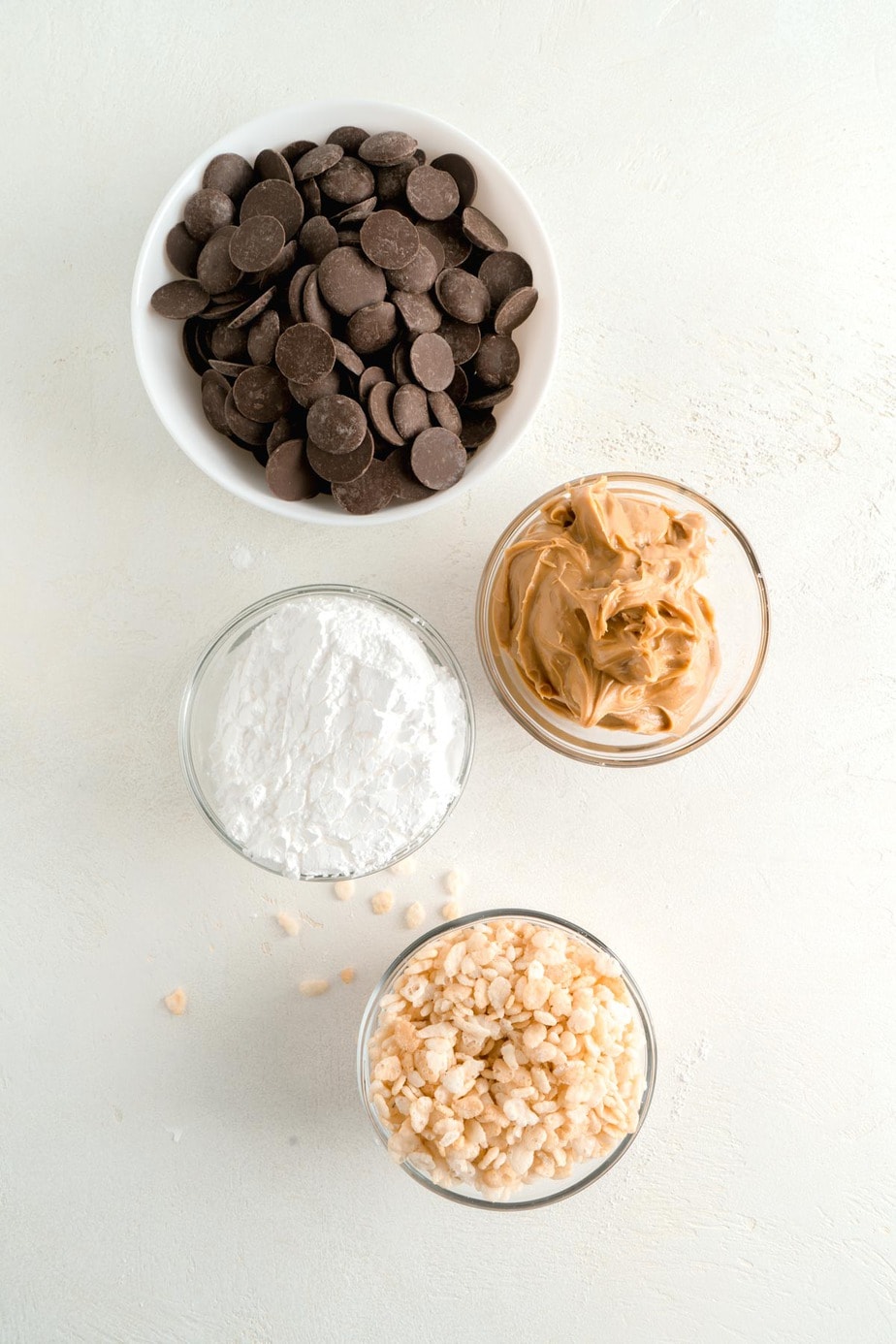 peanut butter ball ingredients in bowls