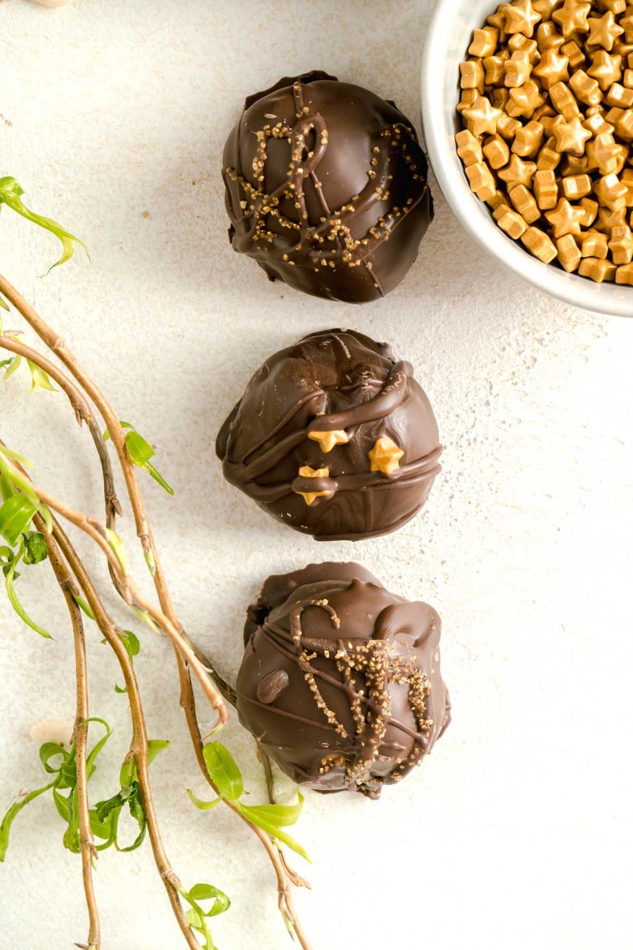 three peanut butter balls on a table