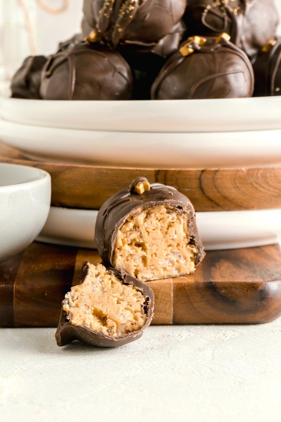 a peanut butter ball sliced in half