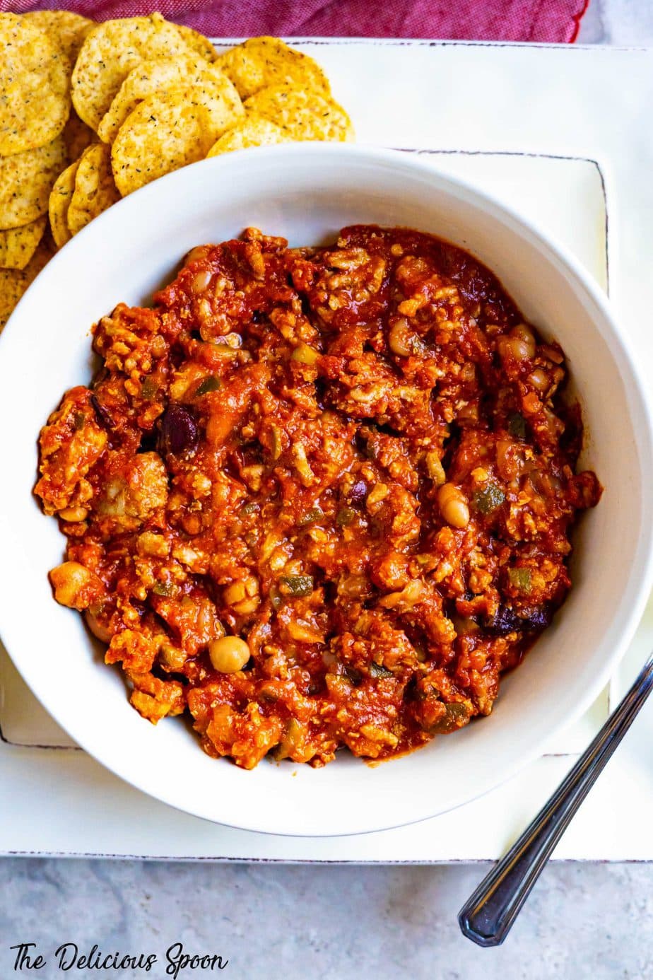 An overhead shot of a bowl of turkey chili