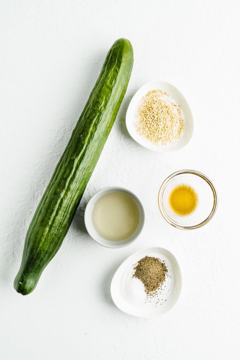cucumber salad ingredients on a table