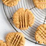 A gluten free peanut butter cookie recipe on a cooling rack.
