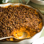 A sweet potato crunch recipe with a spoonful missing.