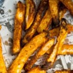 Pinterest pin showing air fryer turnip fries on newsprint.