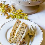 A piece of keto carrot cake on a plate with a fork