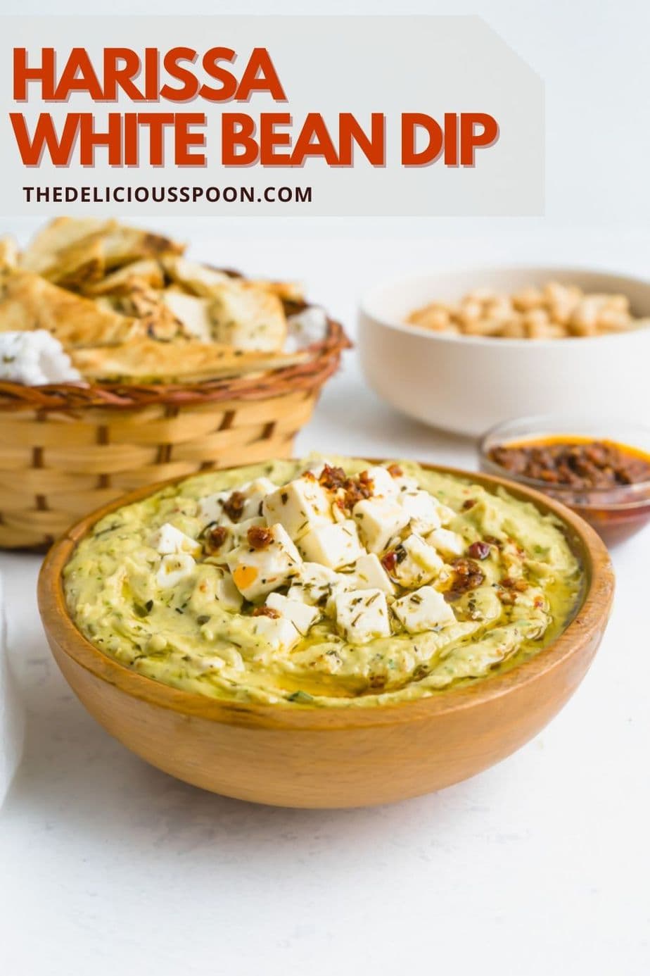 A pinterest pin showing a cannellini bean dip recipe in a wood bowl