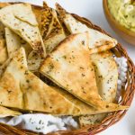A basket of baked pita chips
