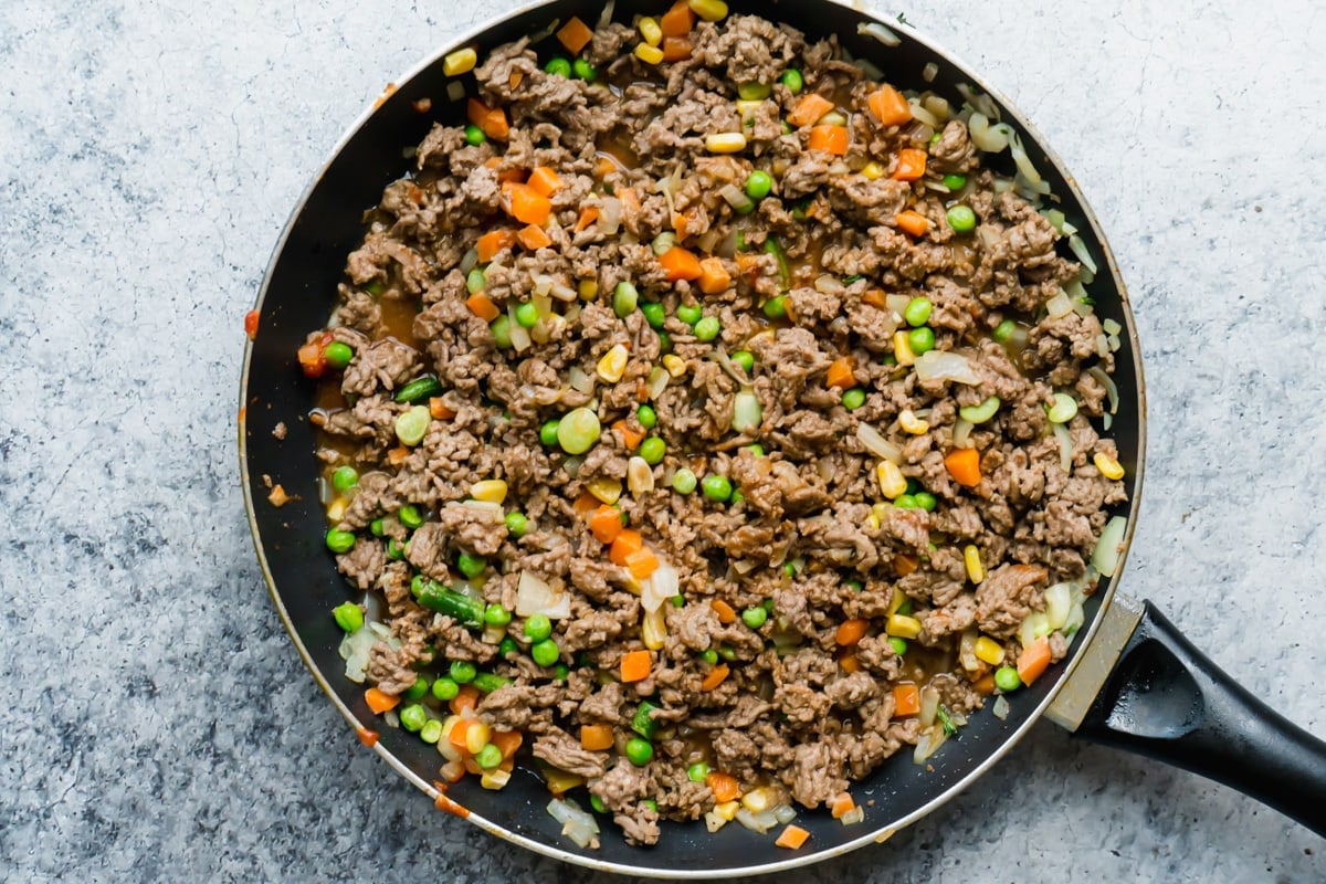 Crumbled cooked ground beef and veggie mix.
