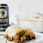 A slice of a classic cottage pie on a plate
