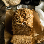 Easy Beer Bread on a table sliced.