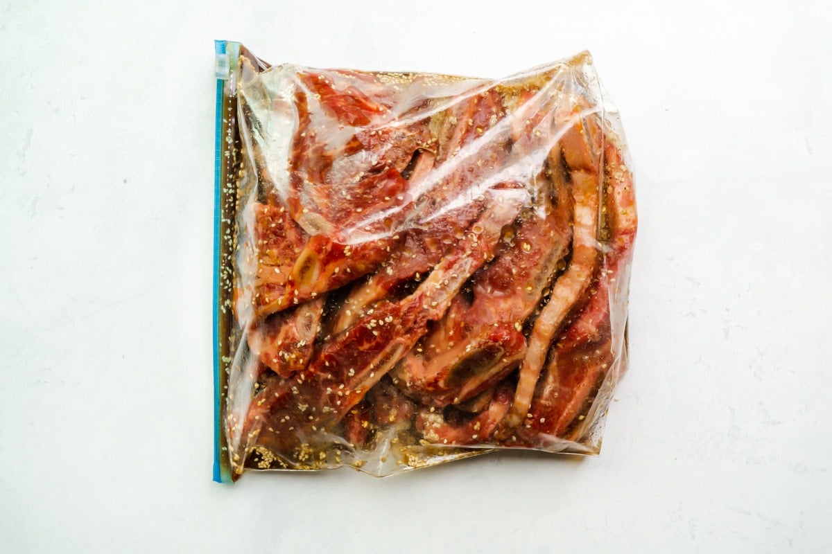 A bag of kalbi beef ribs being marinated
