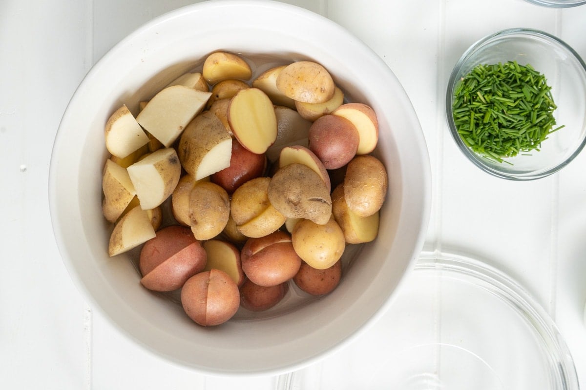 A bowl of chopped baby potatoes
