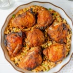 Crispy Oven Baked Chicken and rice in an oven dish