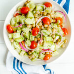 Cucumber Chickpea Salad in a white plate