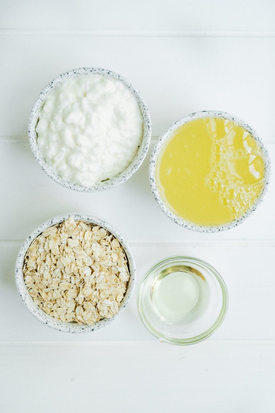 oatmeal pancake ingredients in bowls