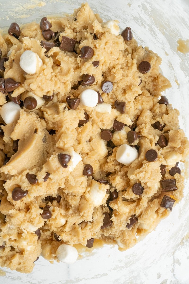 Marshmallow chocolate chip cookie batter in a bowl.