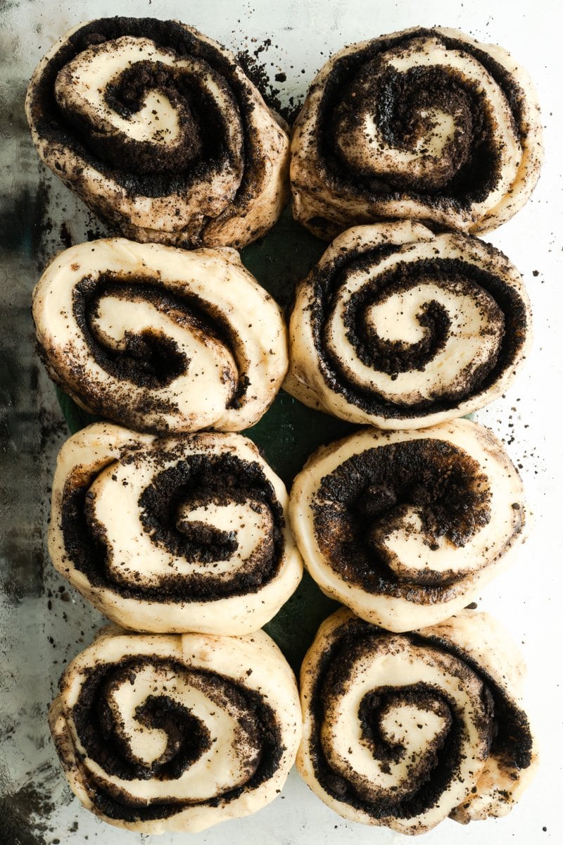 Raw Oreo Cookie Cinnamon Buns in a baking dish.