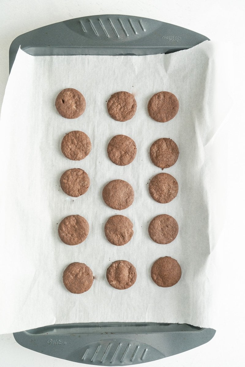 Home made thin mint cookies on a baking sheet.