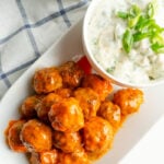 Gluten free turkey meatballs in buffalo sauce.