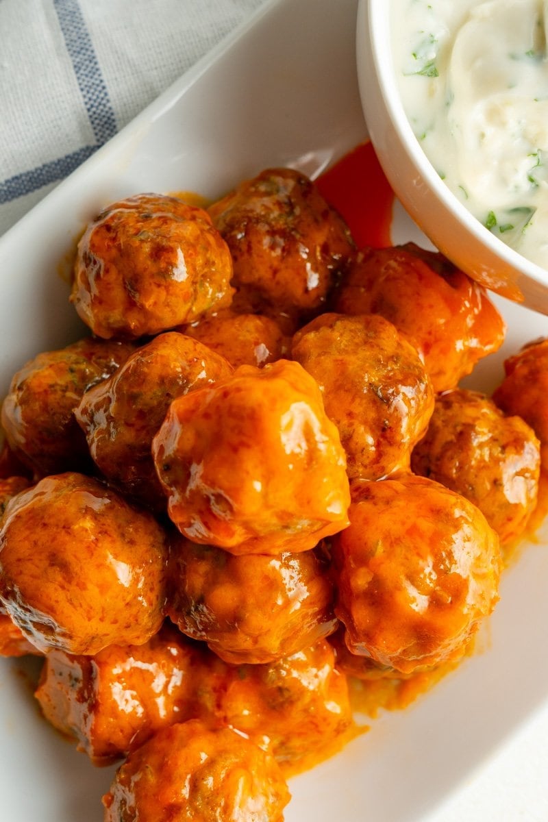 Air fryer turkey meatballs on a small platter overhead.