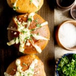 Korean Cream Cheese Garlic Bread on a cutting board with parsley and salt.