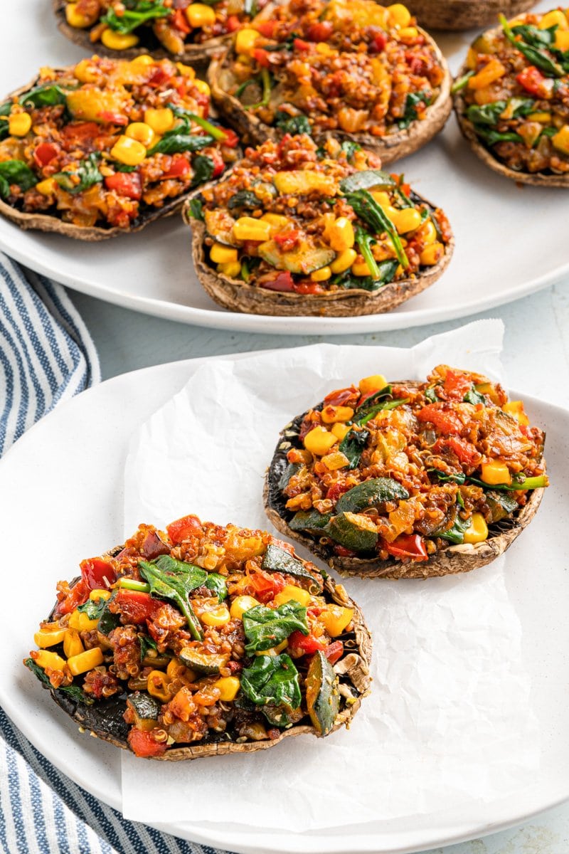 Vegan stuffed portobello mushrooms on a plate.