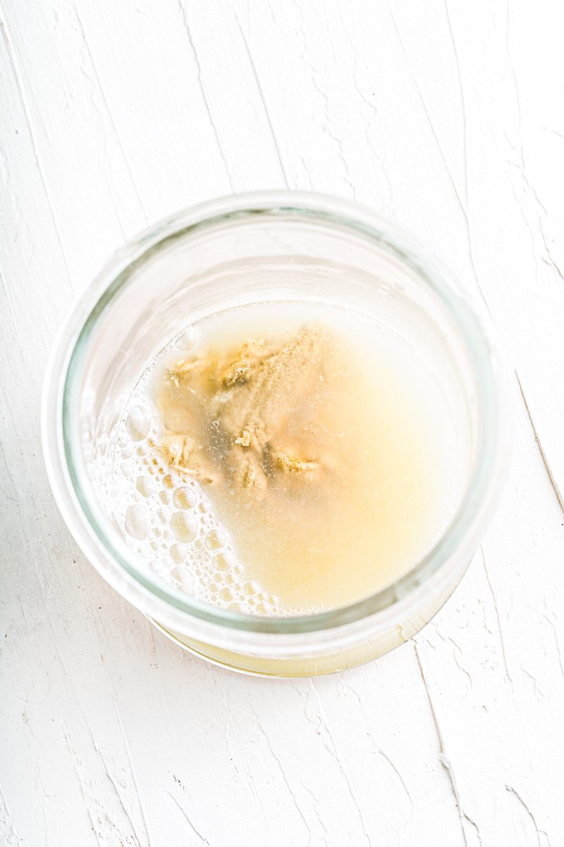 Ingredients for vegan mayonnaise in a jar.