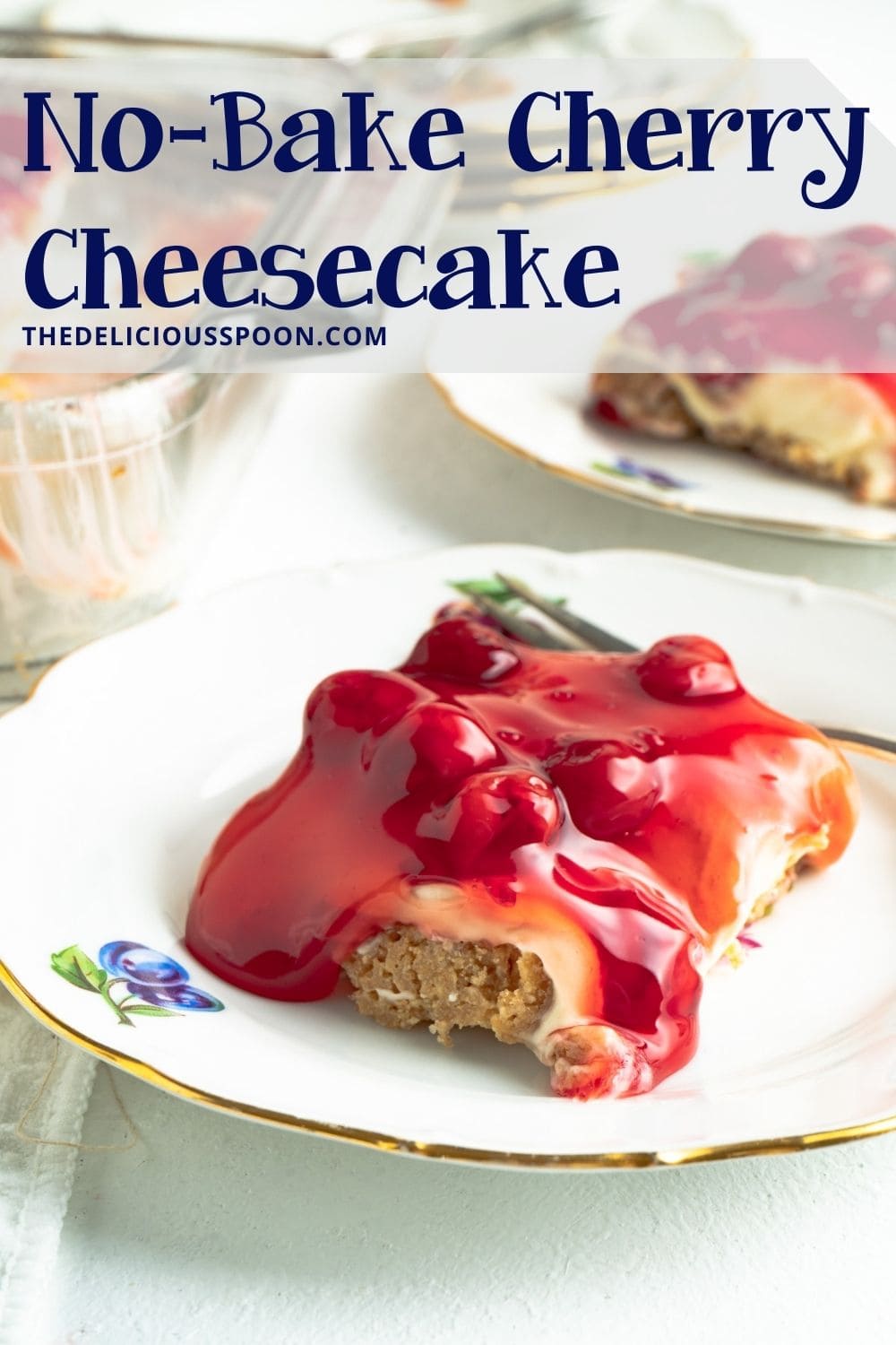 Pinterest pin showing a slice of a cherry cheesecake dessert.