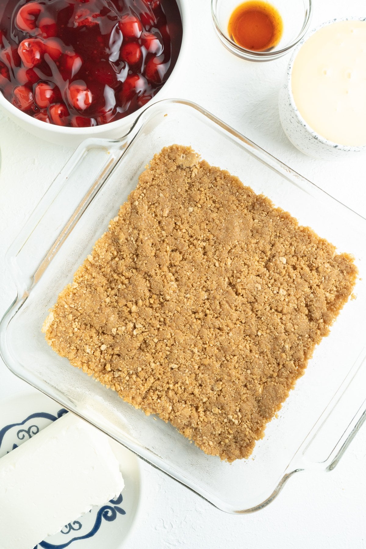 Graham cracker crust pressed into a 9X9 glass pan.