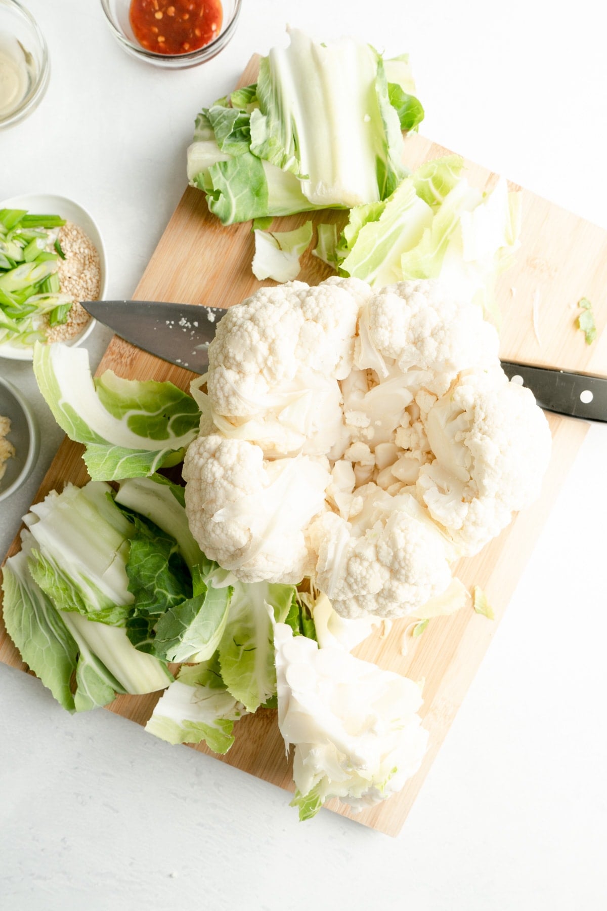 Cauliflower being chopped.