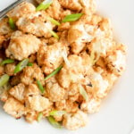 Crispy cauliflower bites in a dish.