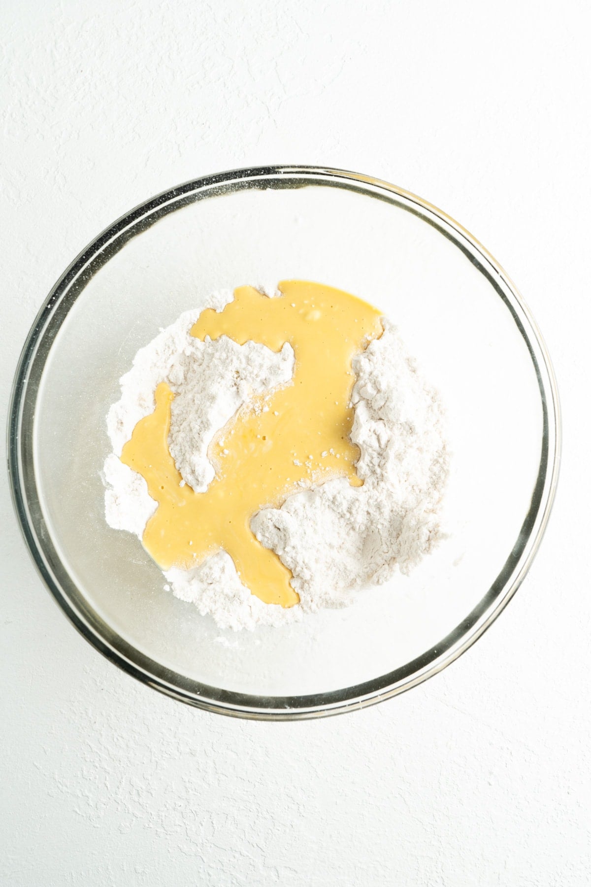 Eggs and flour in a bowl.