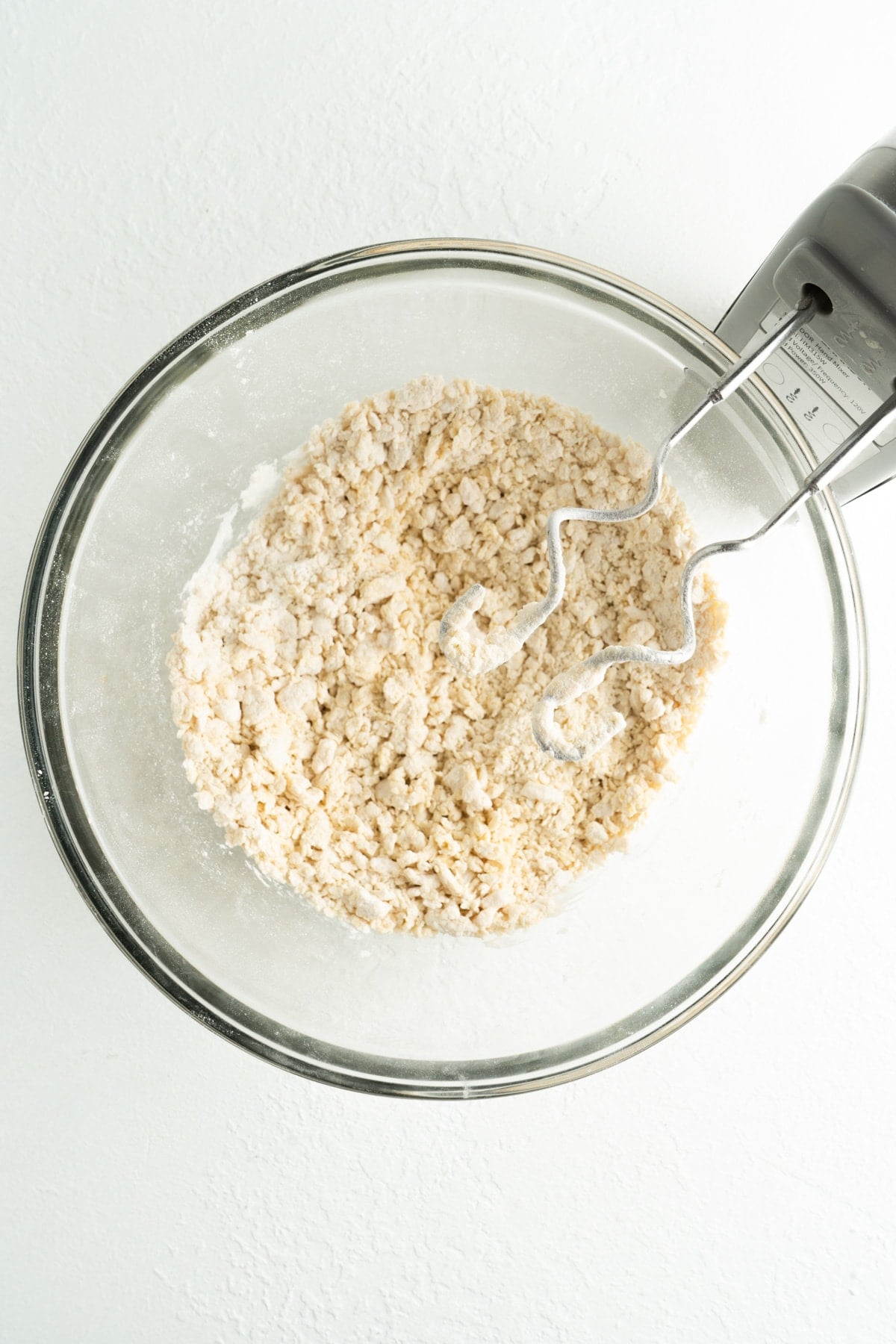 Dough being mixed with a dough hook.