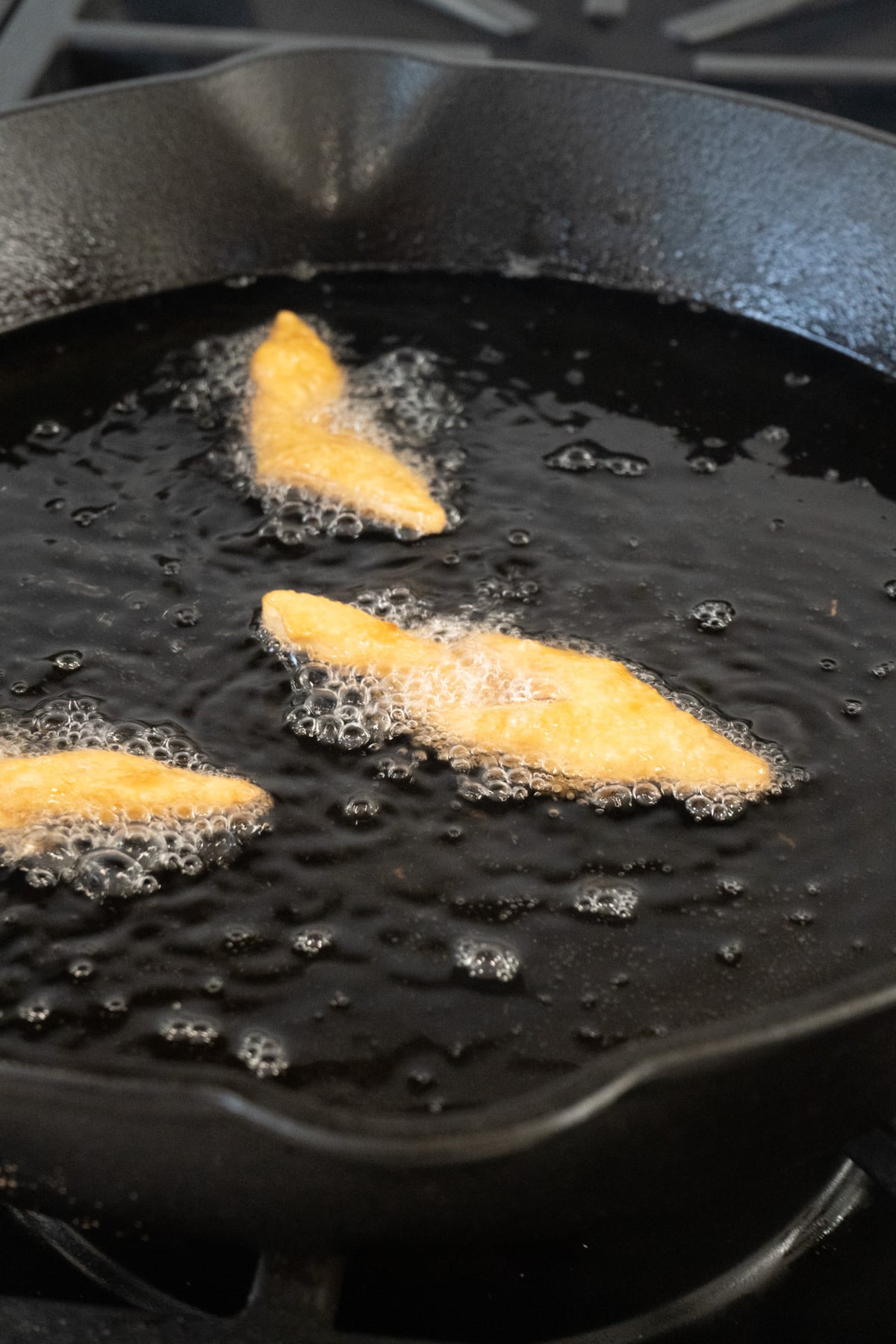 Polish angel wings being fried.