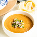 A bowl of carrot gazpacho.
