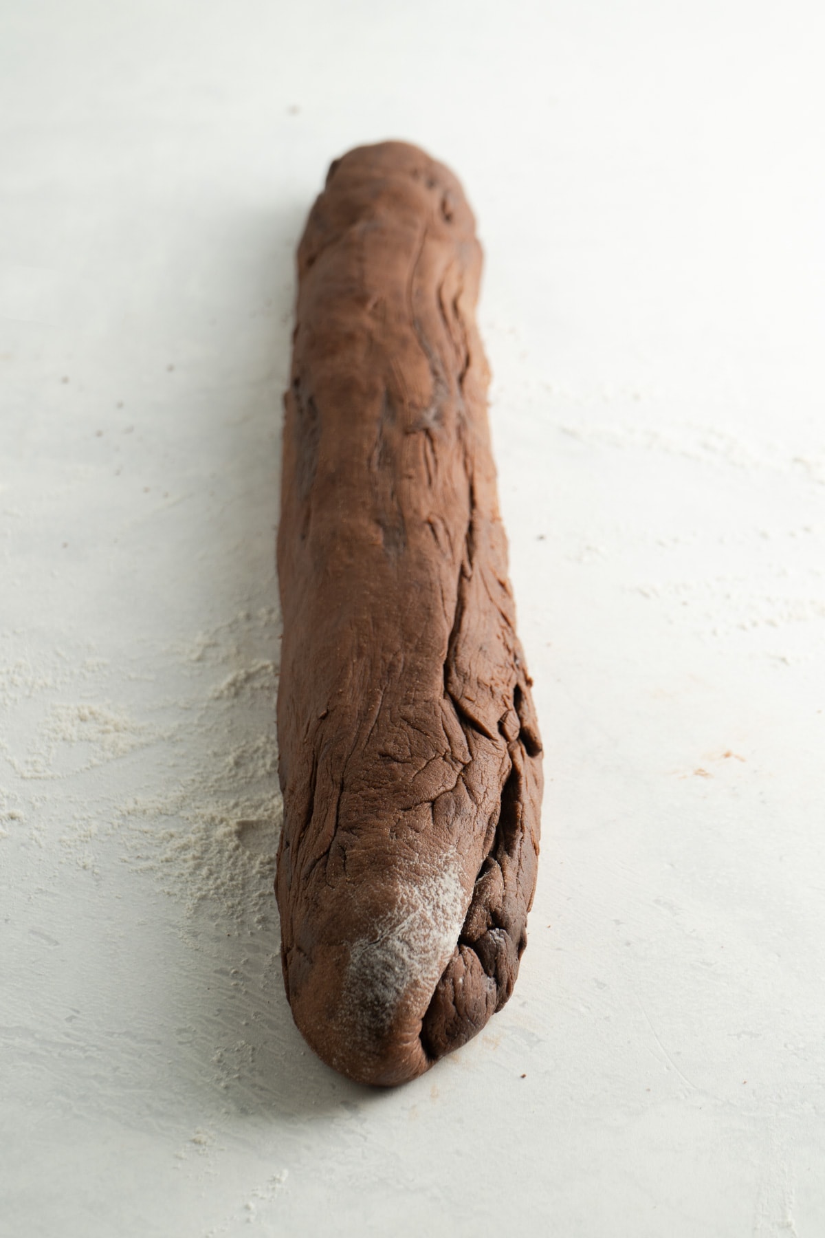 Dough rolled into a log.