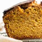 Butternut squash loaf head on with a slice removed.