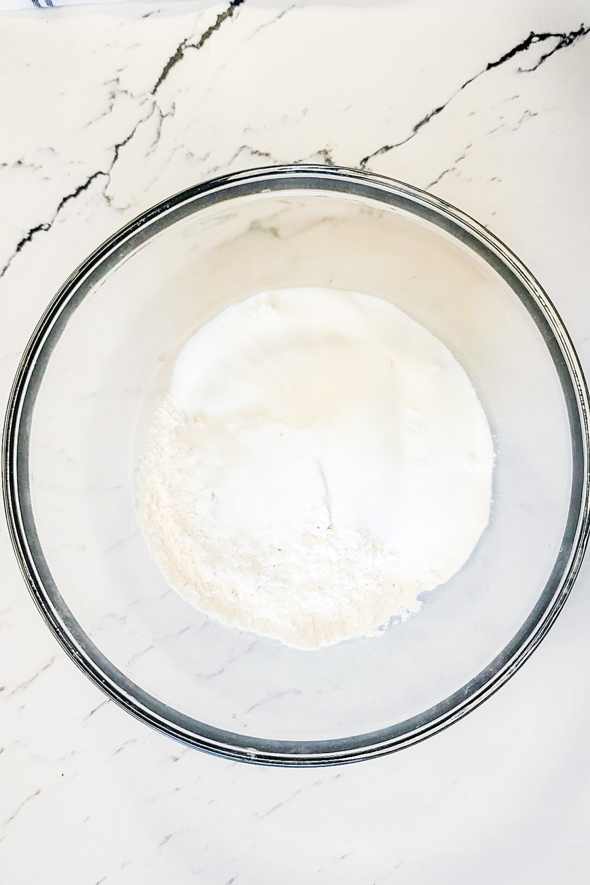 A bowl of flour and sugar.
