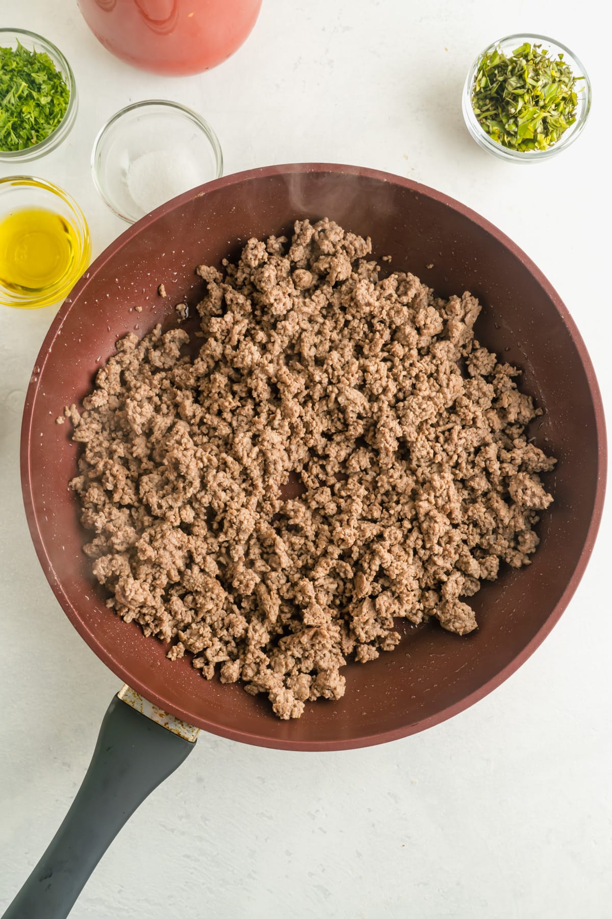 A pan of cooked ground beef.