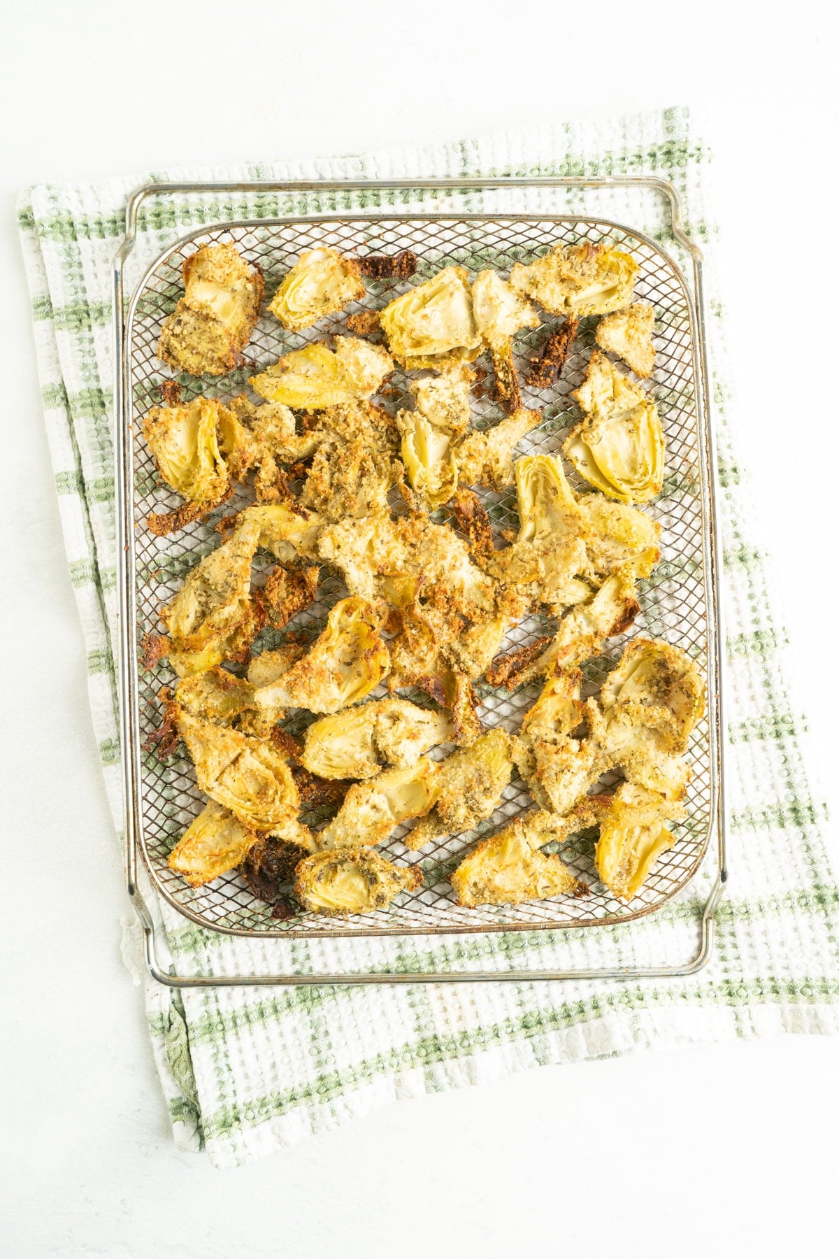 A tray filled with artichokes to be made in the air fryer.