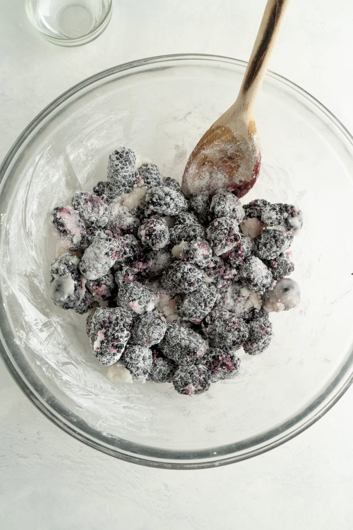 Blackberries in a bowl tossed with cornstarch.