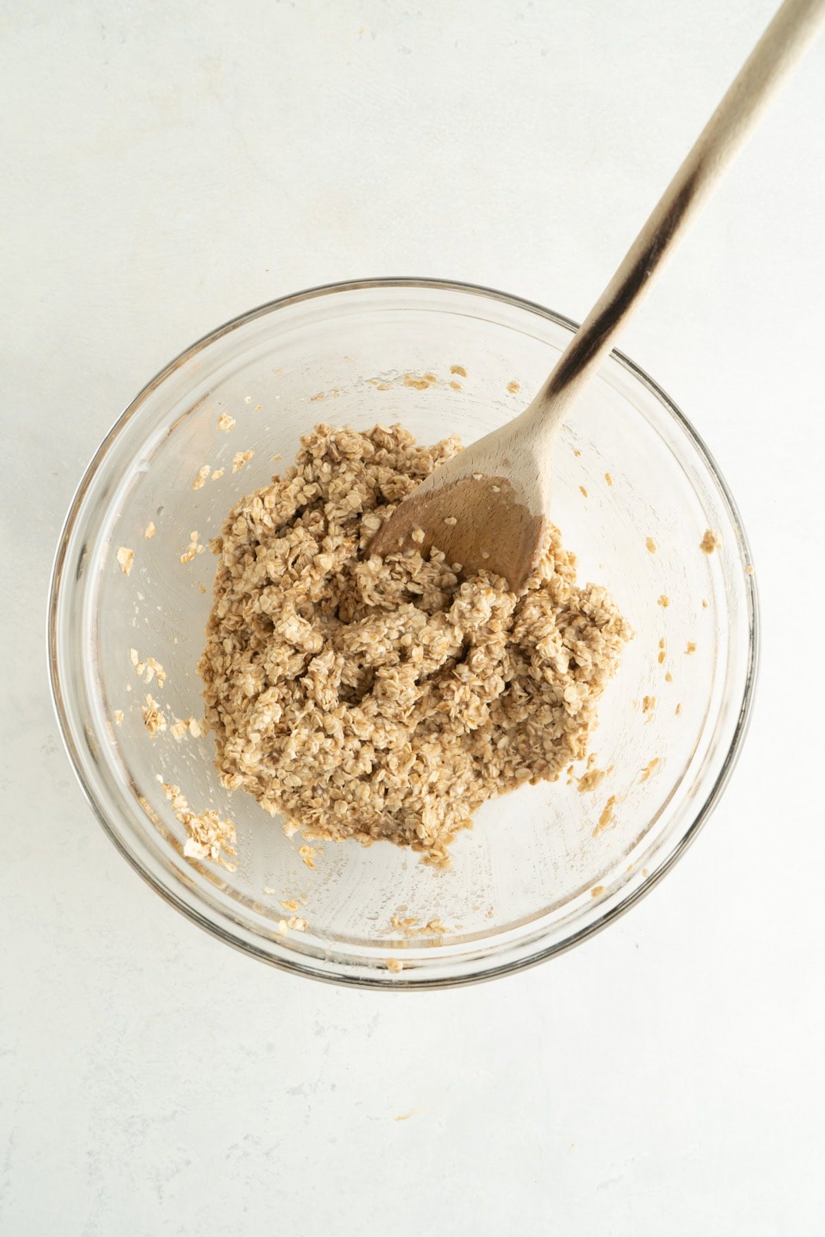 A bowl of oatmeal applesauce cookie batter.