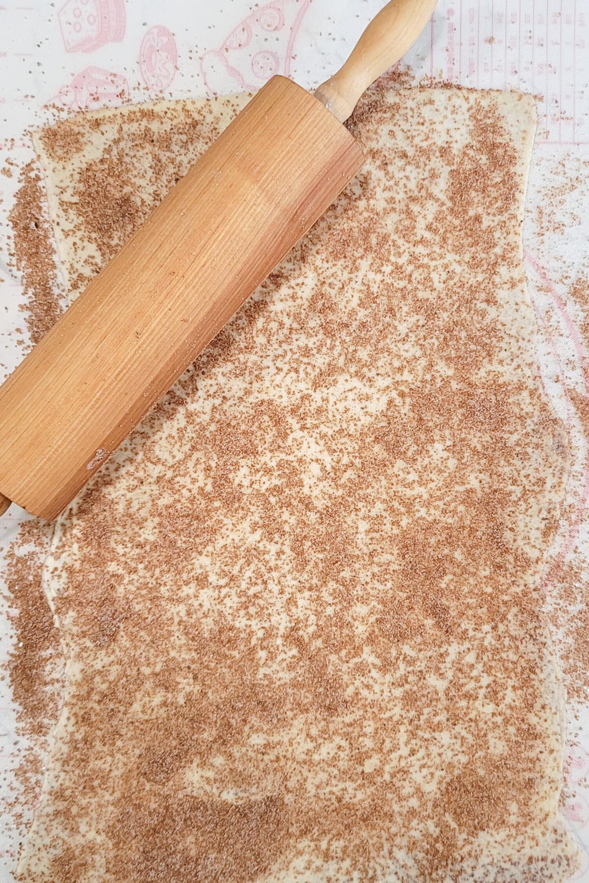 Puff pastry rolled out and sprinkled with pumpkin spice and demura sugar.