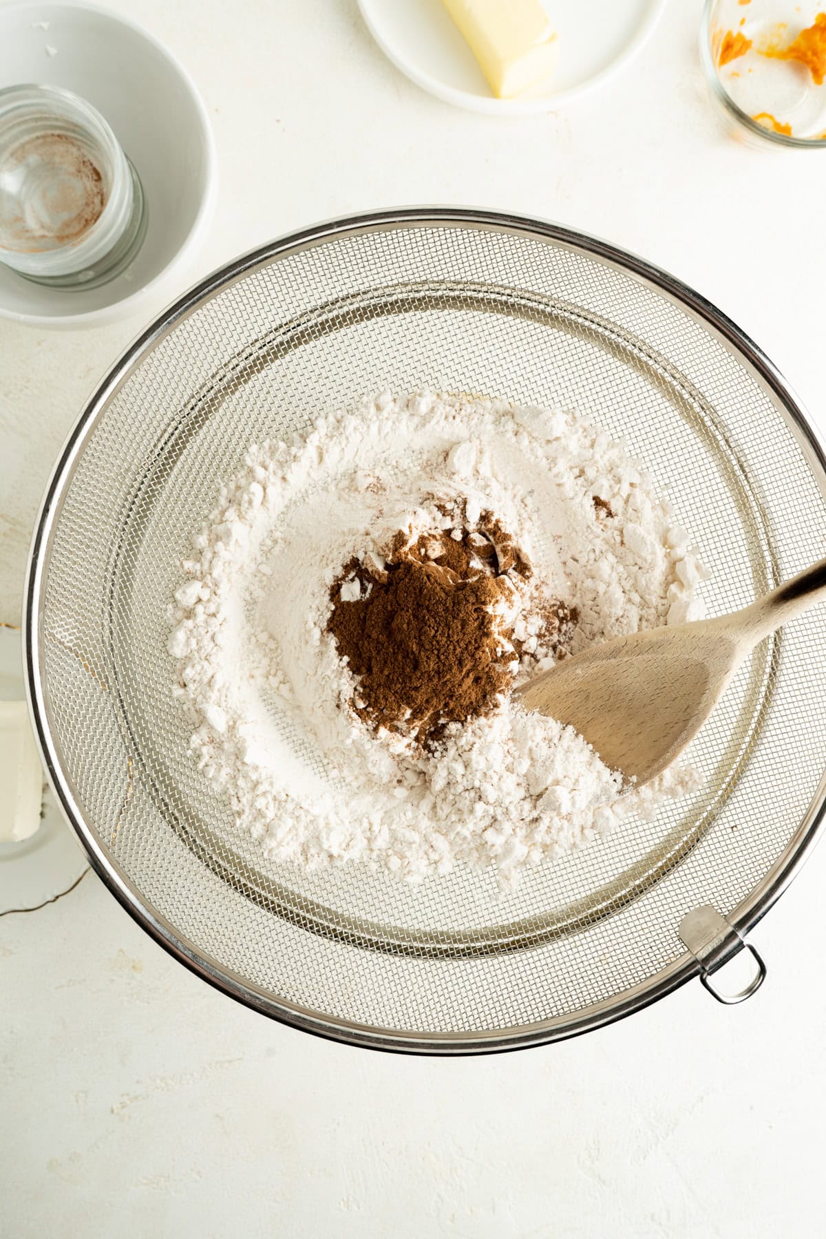 Dry ingredients in a bowl for a pumpkin cheese cake cookie recipe.