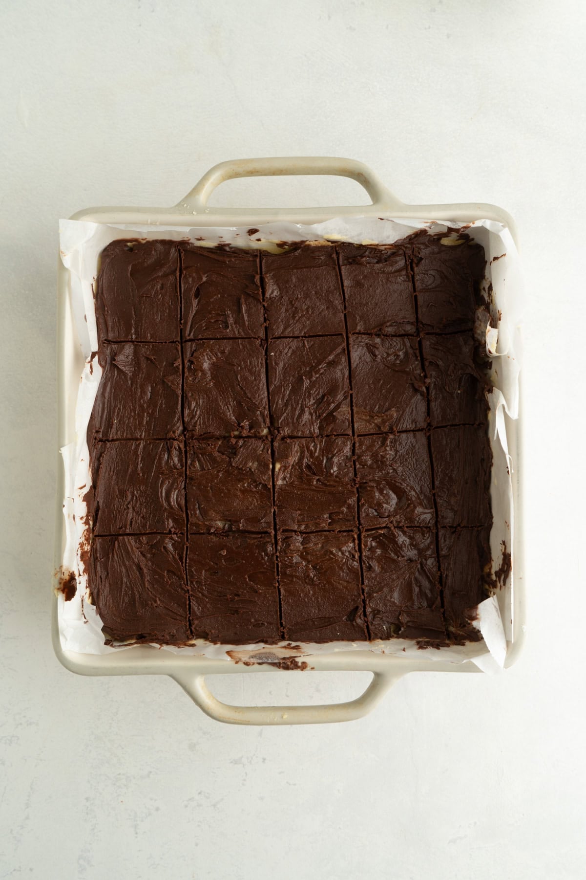 Score marks made in the chocolate topping of a Nanaimo Bar Recipe.
