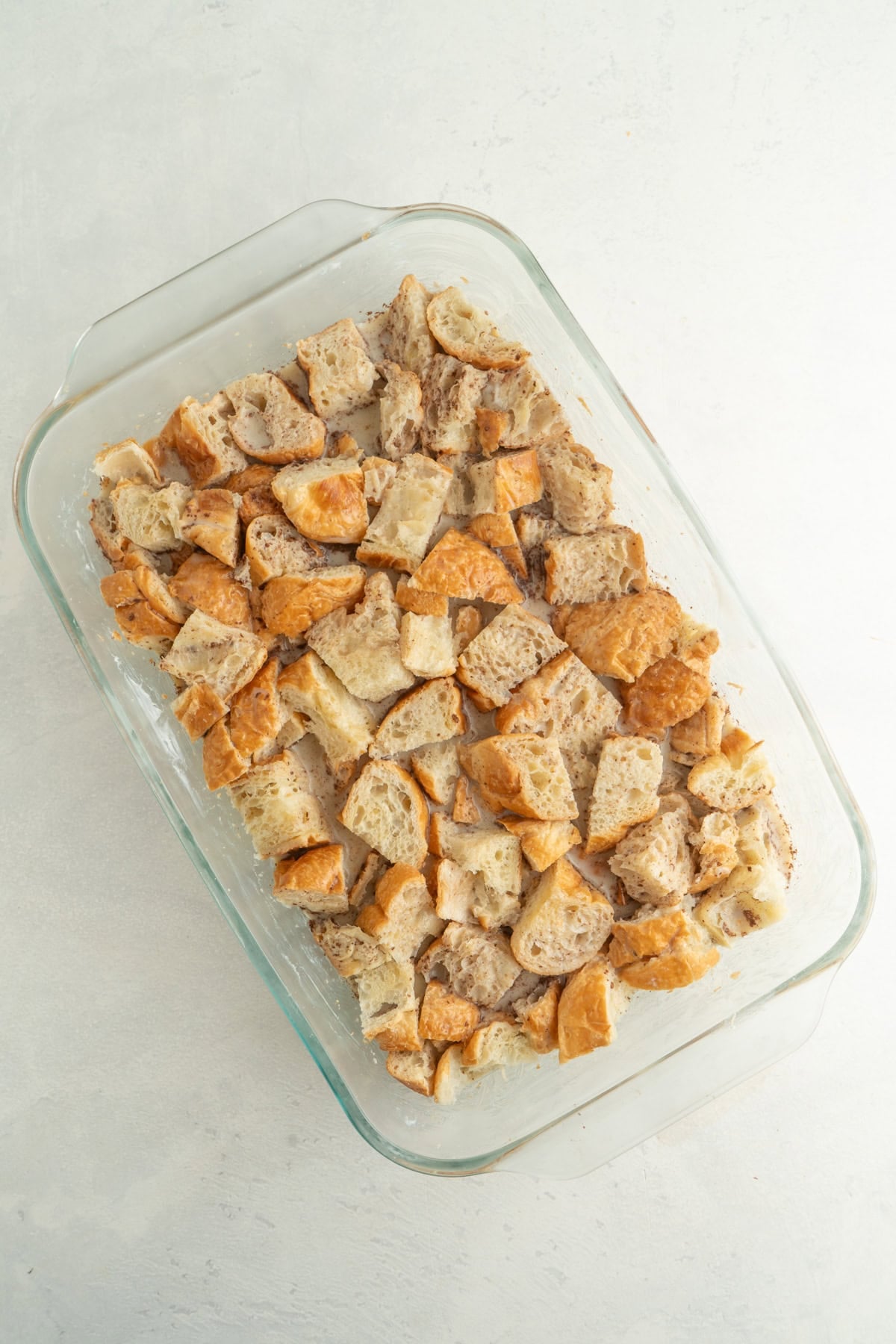 An unbaked overnight French toast casserole.